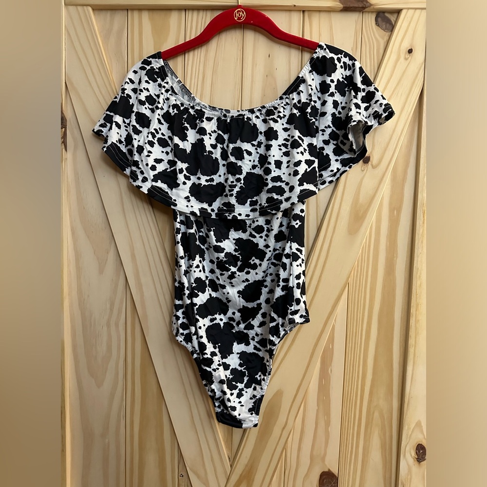 Cow print off the shoulder ruffle trim bodysuit